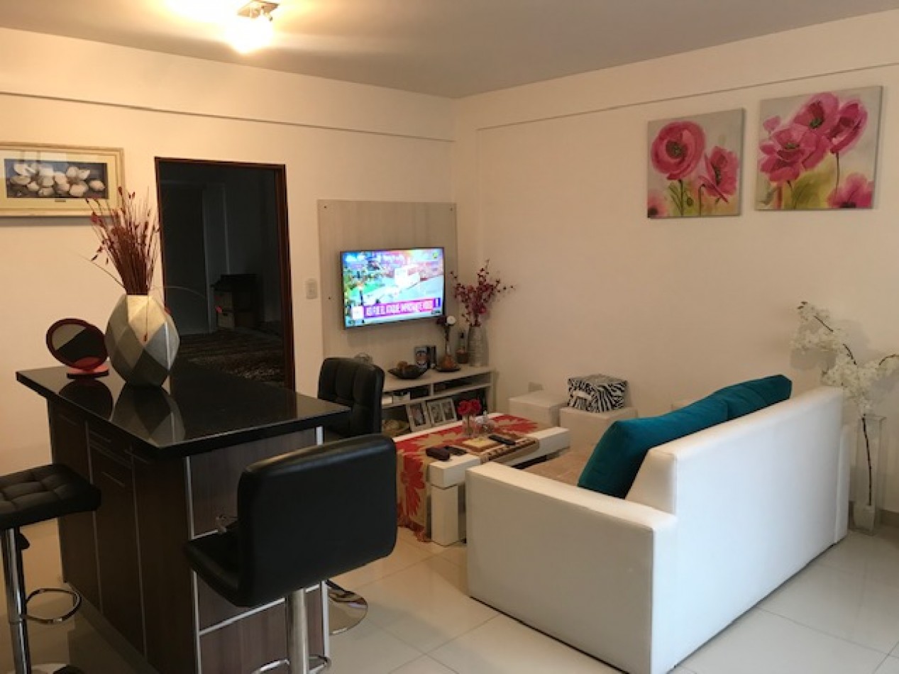 DEPARTAMENTO 2 AMBIENTES CON COCHERA EN EXCELENTE ESTADO