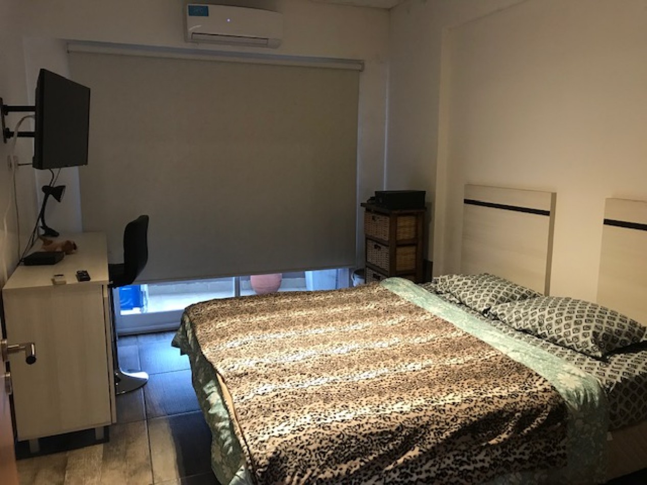 DEPARTAMENTO 2 AMBIENTES CON COCHERA EN EXCELENTE ESTADO