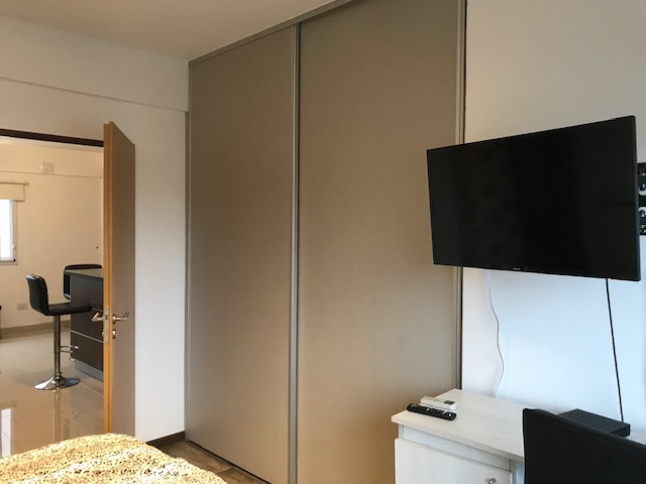 DEPARTAMENTO 2 AMBIENTES CON COCHERA EN EXCELENTE ESTADO
