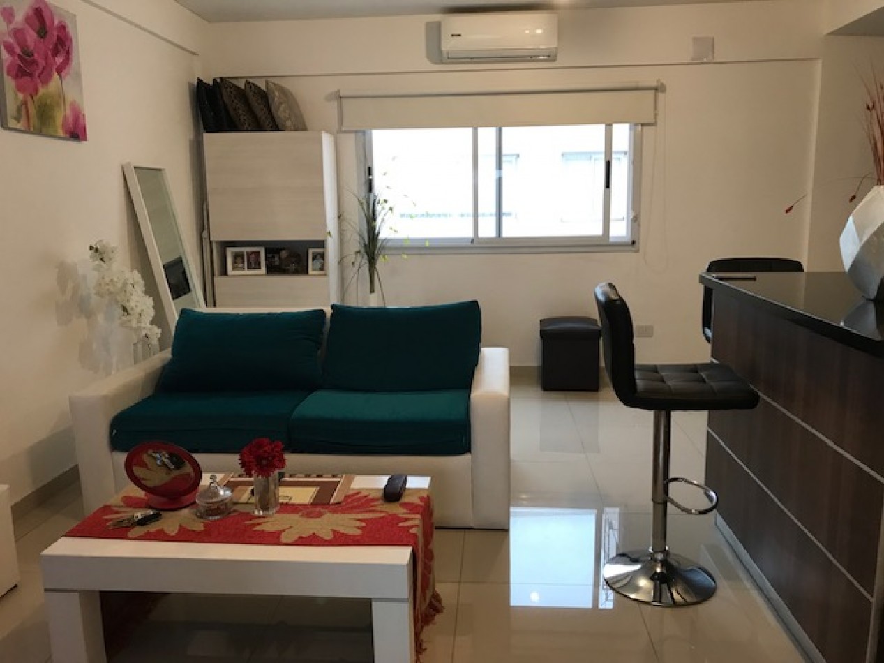 DEPARTAMENTO 2 AMBIENTES CON COCHERA EN EXCELENTE ESTADO