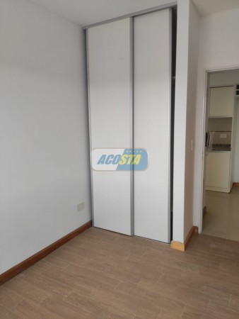 EDIFICIO CON ULTIMAS UNIDADES A ESTRENAR, 2 Y 3 AMBIENTES, CON COCHERA Y TERRAZA