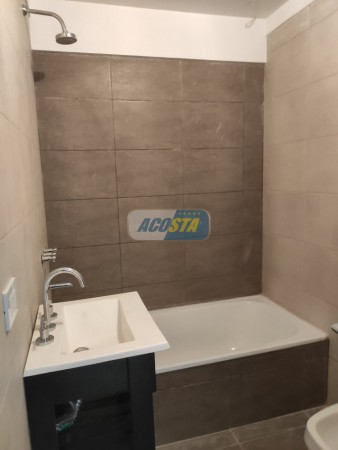 EDIFICIO CON ULTIMAS UNIDADES A ESTRENAR, 2 Y 3 AMBIENTES, CON COCHERA Y TERRAZA
