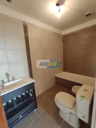 EDIFICIO CON ULTIMAS UNIDADES A ESTRENAR, 2 Y 3 AMBIENTES, CON COCHERA Y TERRAZA